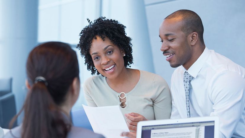 Black couple with loan officer