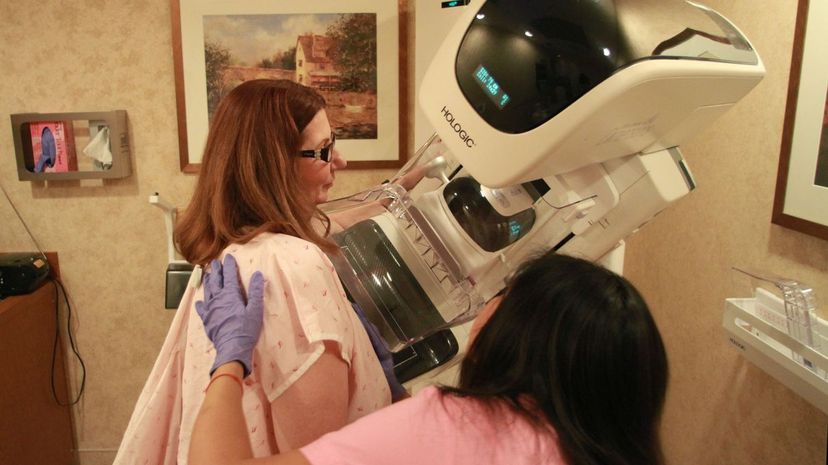 Mary Shallcross is positioned in a 3D digital mammography machine at the Women's Imaging Center at Memorial Regional Hospital in Hollywood, Florida. Amy Beth Bennett/Sun Sentinel/MCT via Getty Images