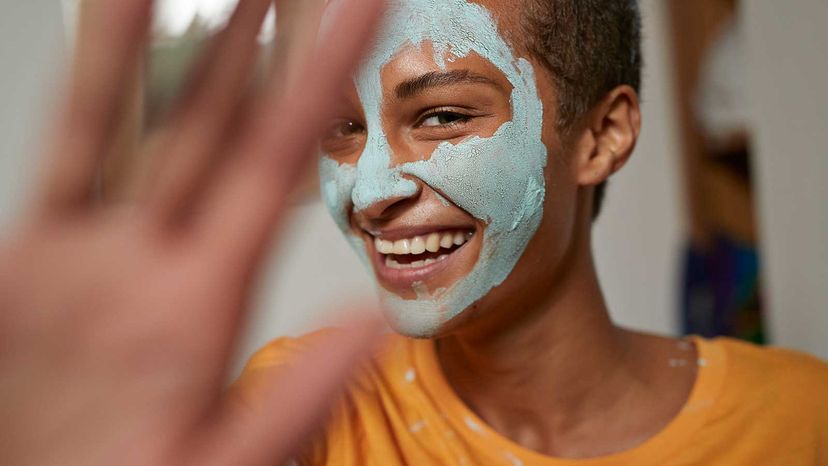 cute girl with facial mask