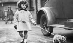 Taking your cat for a stroll didn't necessarily go out of fashion in the 1930s.